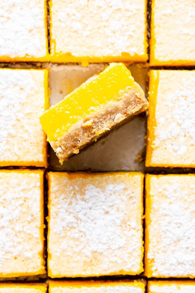 overhead of lemon bars with one turned on its side