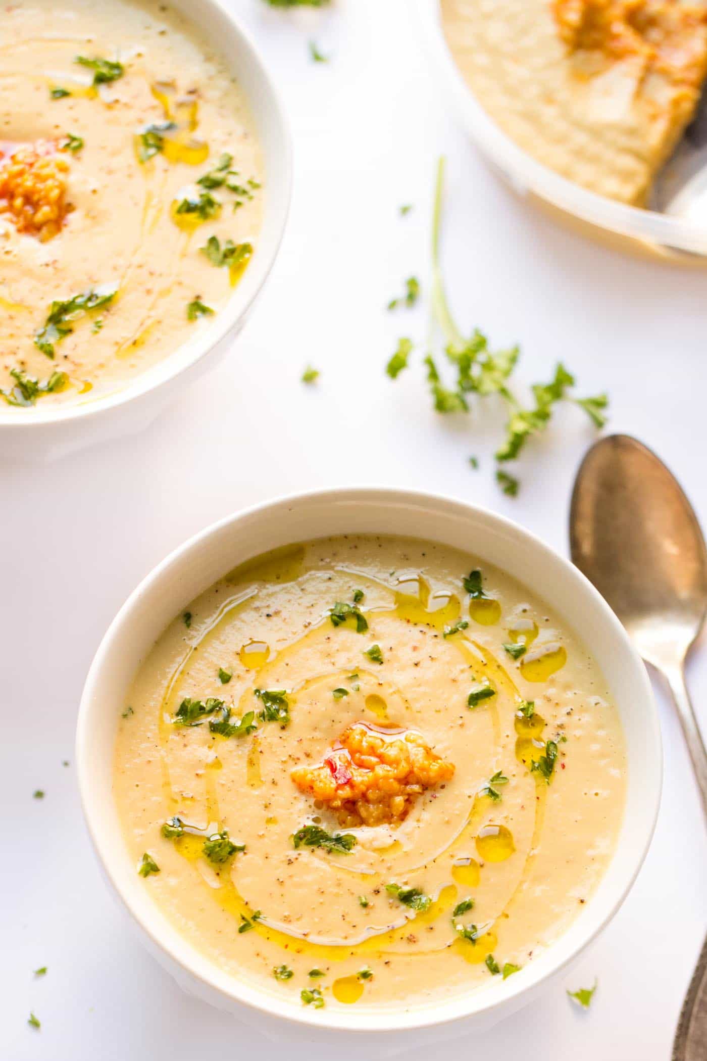 This cauliflower chowder comes together in 30 MINUTES, is filled with protein and roasted garlic flavor {VEGAN}