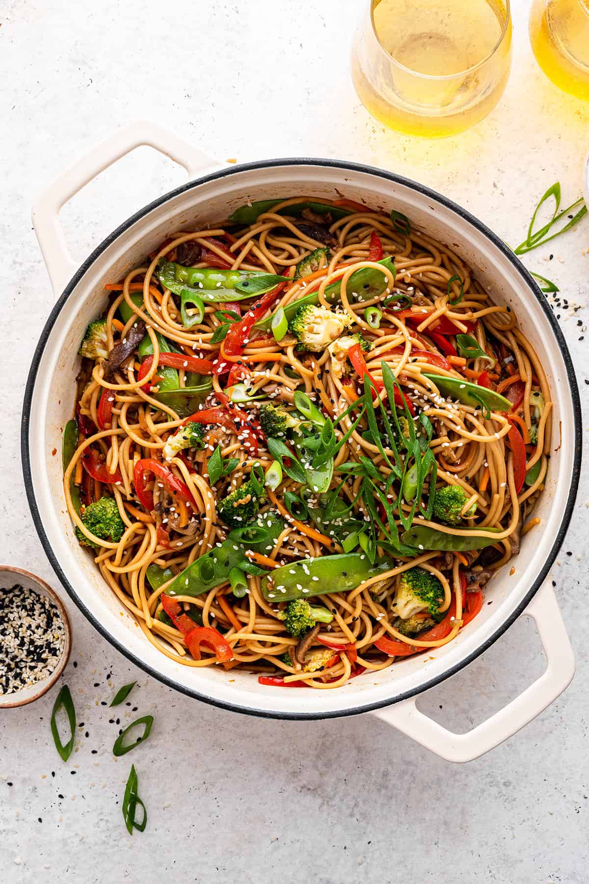 Vegetable lo mein in white Dutch oven